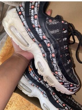 Nike Women’s Black/White/Orange 'Just Do It' Sneakers